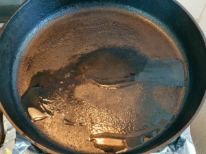 Small amount of oil in a cast iron pan